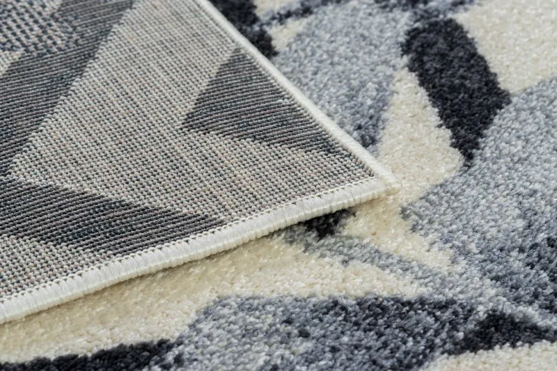 Teppich HEOS 78540 creme / blau BLÄTTER URWALD