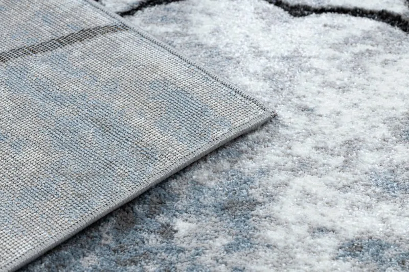 Modern Teppich COZY 8873 Cracks, gerissener Beton- Strukturell zwei Ebenen aus Vlies hellgrau / blau