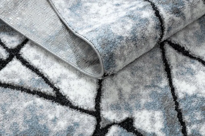 Modern Teppich COZY 8873 Cracks, gerissener Beton- Strukturell zwei Ebenen aus Vlies hellgrau / blau