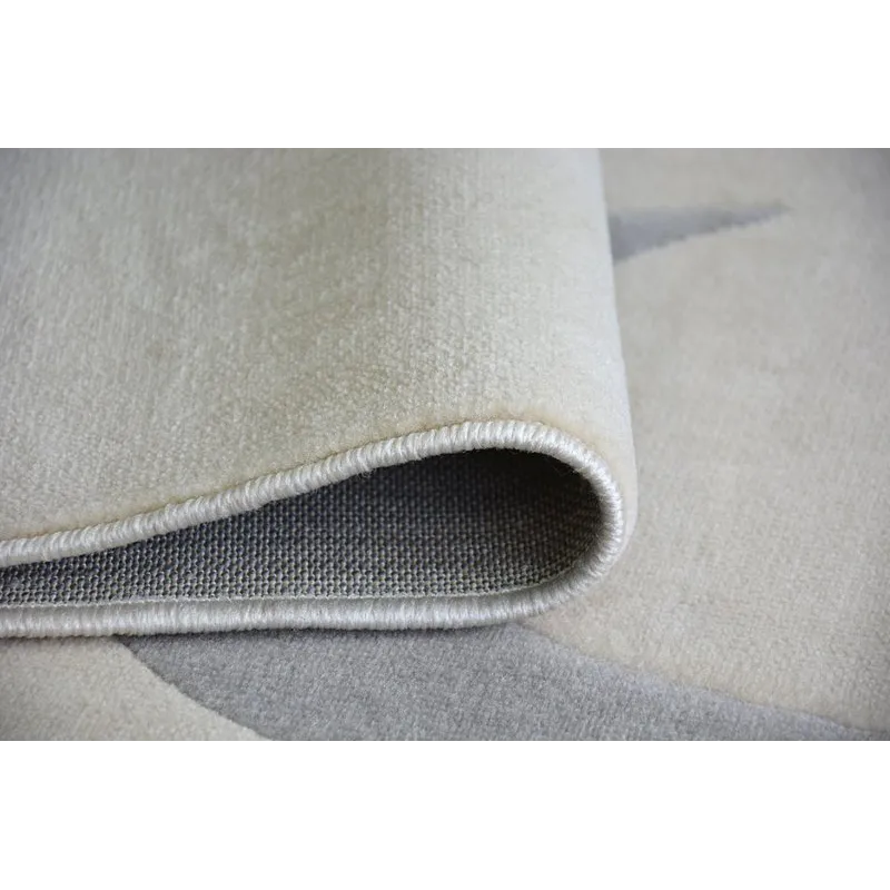 Eleganter cremefarbener Teppich, ideal für moderne Wohnräume