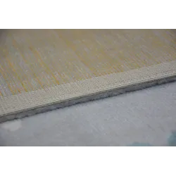 Garten Teppich in grau und creme mit türkisfarbenen Akzenten