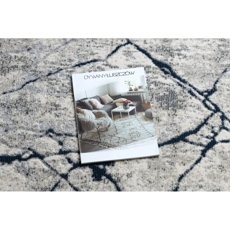 Moderner Teppich REBEC in Creme und Dunkelblau, ideal für moderne Wohnräume