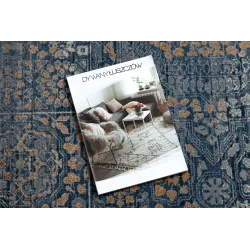 Eleganter Wollteppich in Blau und Orange Muster