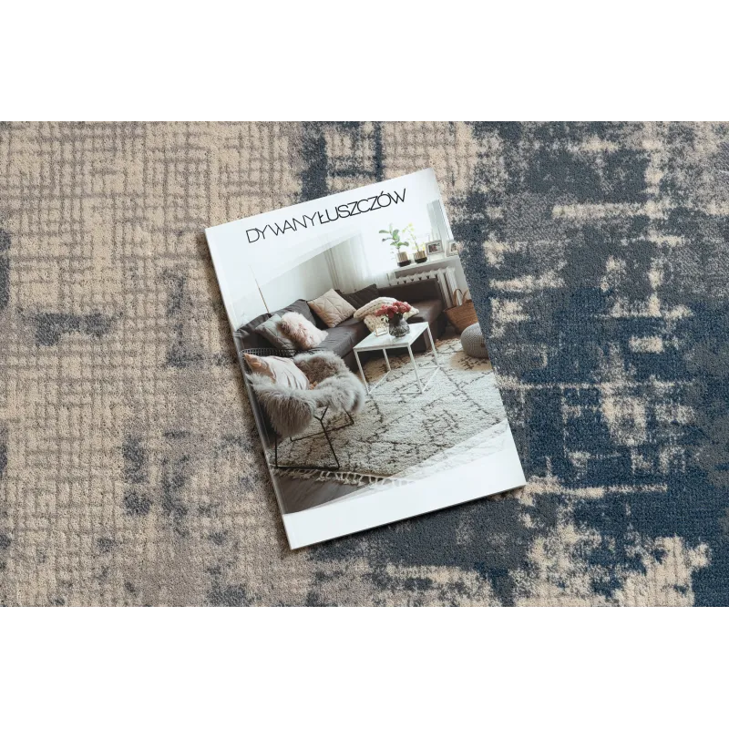Beiger und blauer Wollteppich, perfekt für das Wohnzimmer geeignet
