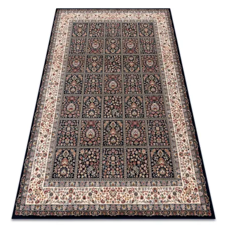 Wollteppich NAIN mit dunkelblauen und beige Blumen, perfekt für das Wohnzimmer