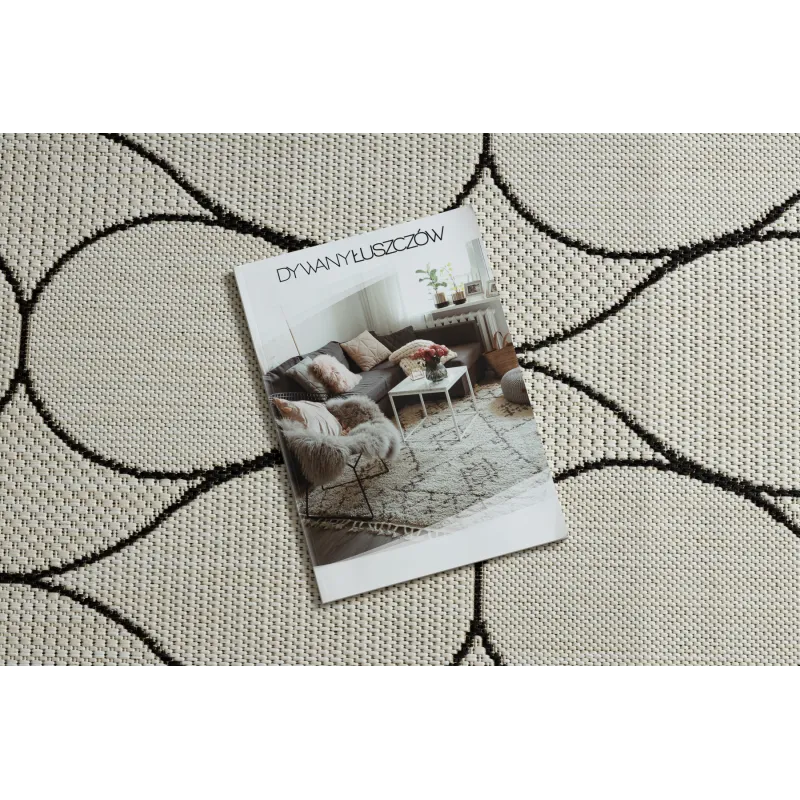 Eleganter Teppich in Creme und Schwarz, ideal für das Wohnzimmer